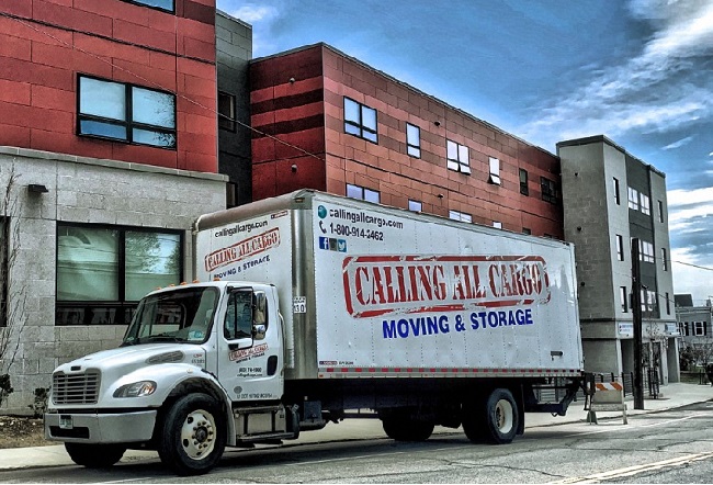 "Calling All Cargo Moving & Storage" Truck