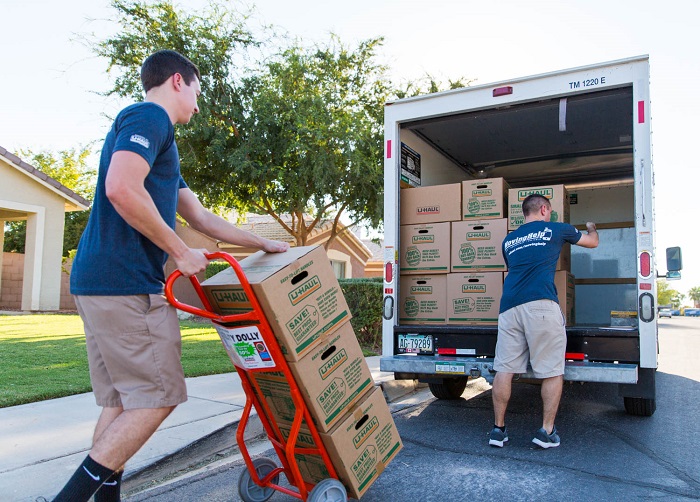 Getting help from Professional movers - Top 12 Things To Prepare Before Moving Into A New House