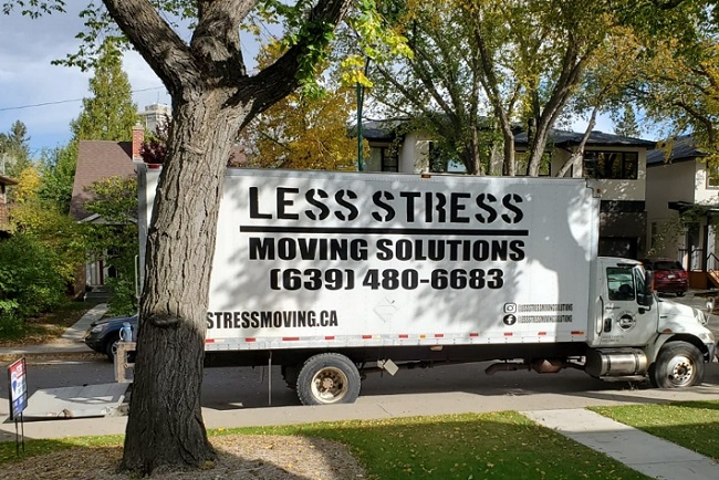 "Less Stress Moving Solutions" Truck